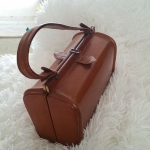 This exquisite bucket bag hails from the glamorous 1930s It is true fashion